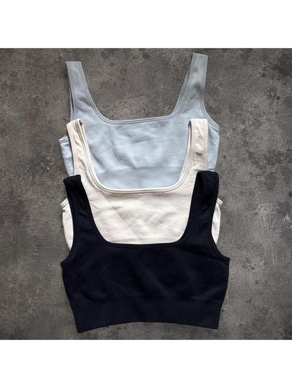 Beautful bundle of ribbed crop tops in black, white, and light blue
